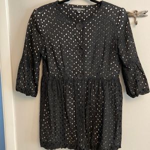 Black top white lining shoulder pads